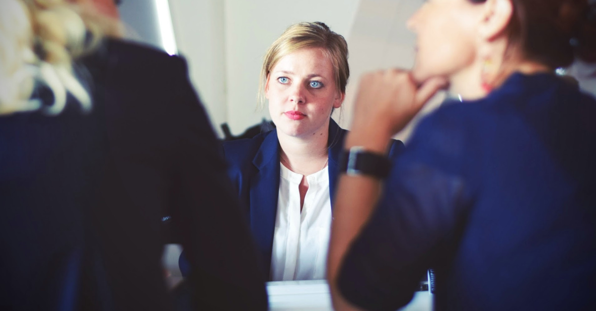 woman in media law meeting with two women clients